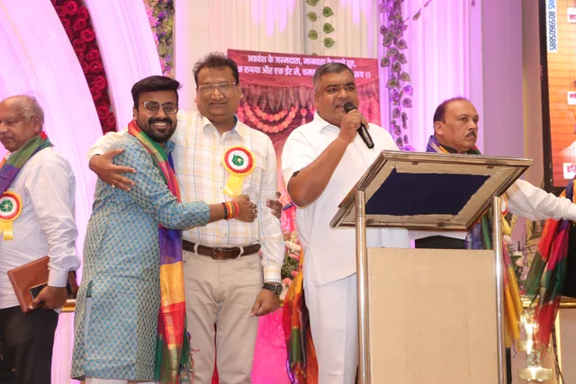 A speaker addressing the community during the celebration, photo 17, 17 October 2026