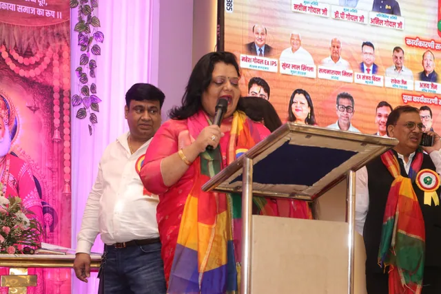 A speaker addressing the community during the celebration, photo 24, 17 October 2026