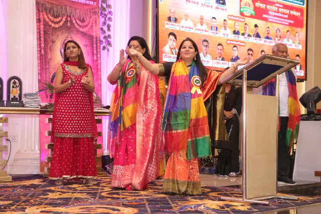 A speaker addressing the community during the celebration, photo 32, 17 October 2026