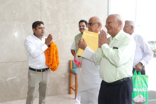 Guests and members greeting one another at the gathering, photo 4, Shapath Grahan, 4 July 2026