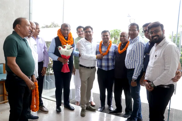 Guests and members greeting one another at the gathering, photo 6, Shapath Grahan, 4 July 2026