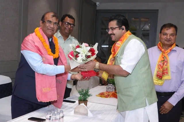 Guests and members greeting one another at the gathering, photo 11, Shapath Grahan, 4 July 2026
