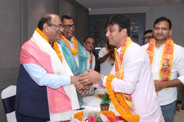 Guests and members greeting one another at the gathering, photo 14, Shapath Grahan, 4 July 2026