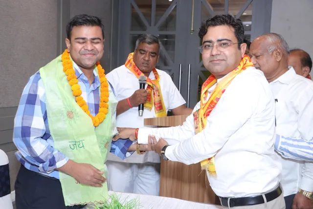 Guests and members greeting one another at the gathering, photo 15, Shapath Grahan, 4 July 2026